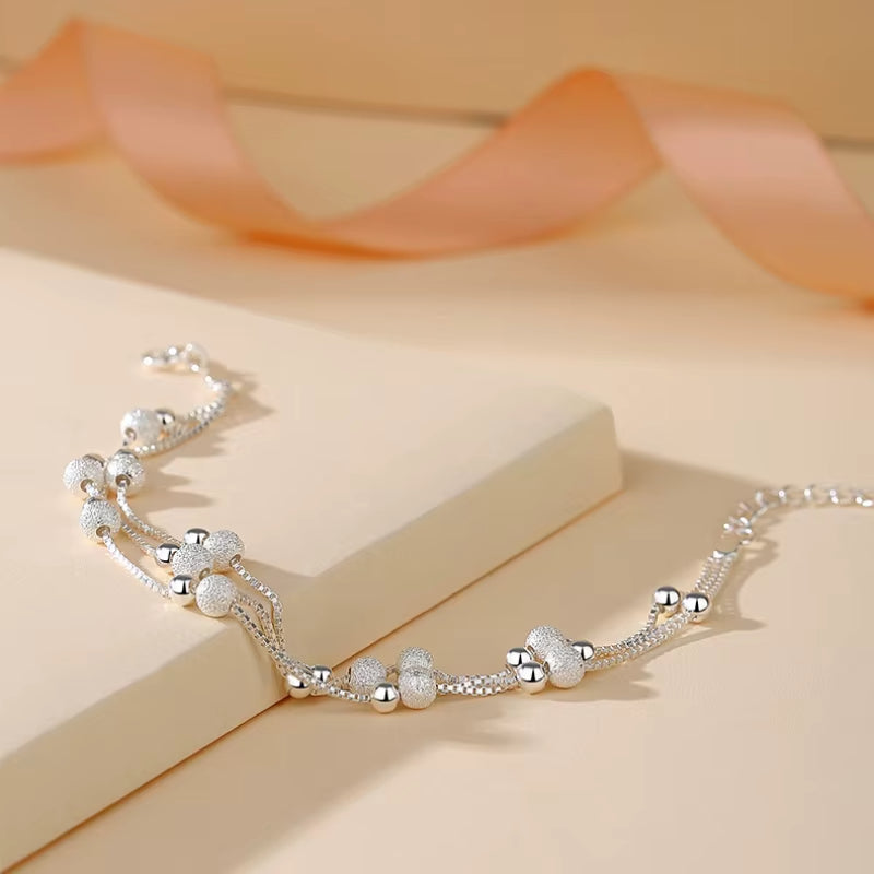 Bracelet Argenté Double Chaine à Perles