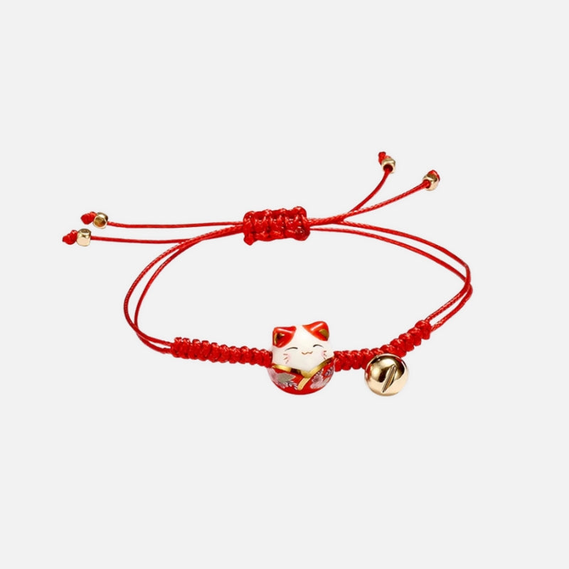 Bracelet Japonais Maneki Neko Tressé à Grelot sur fond blanc et rouge