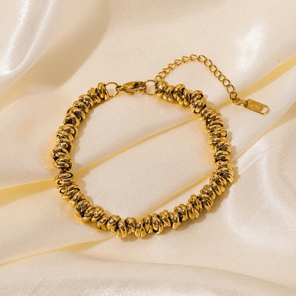 Bracelet Acier Inoxydable Anneaux Entrelacés Dorés