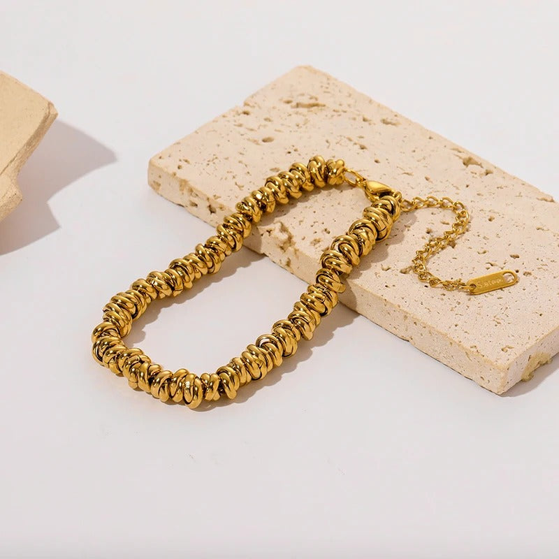 Bracelet Acier Inoxydable Anneaux Entrelacés Dorés