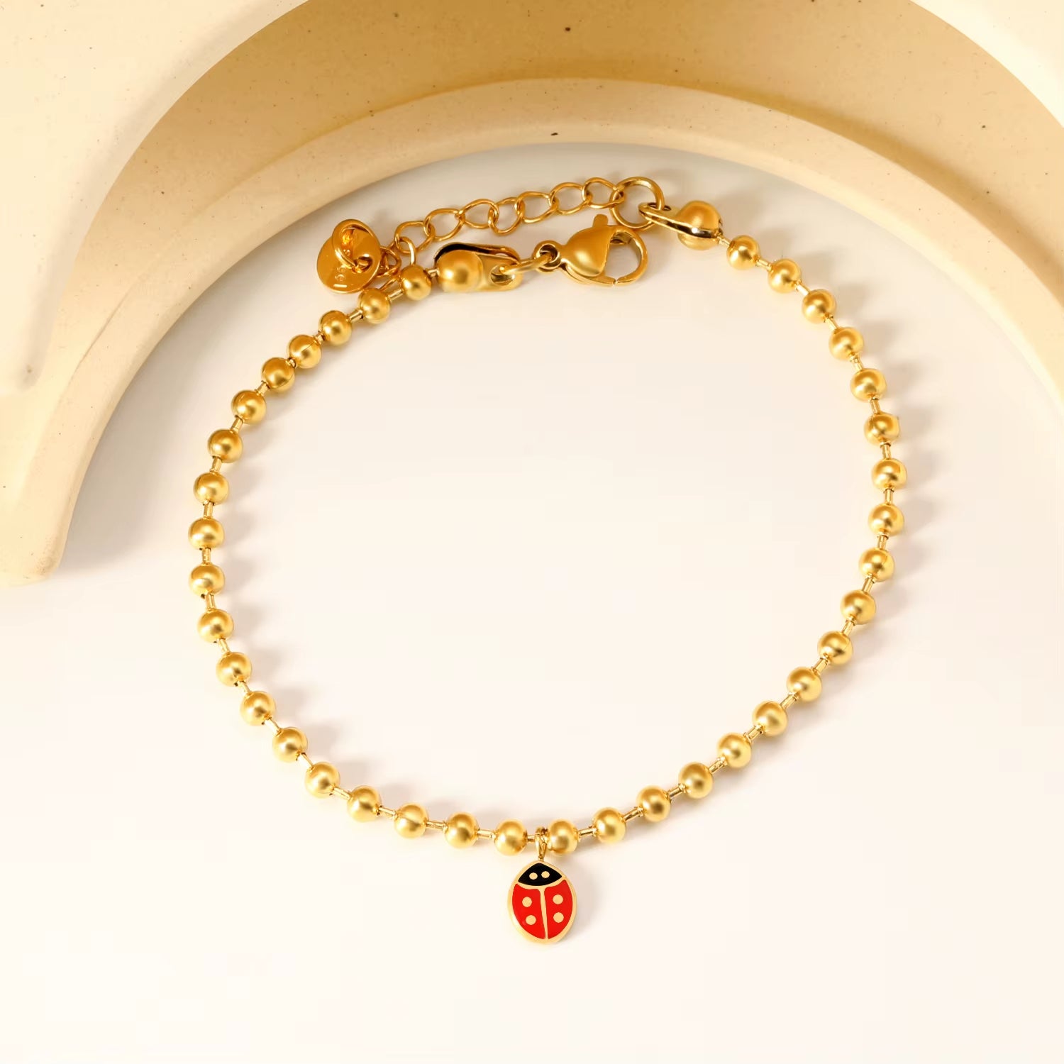 Bracelet Coccinelle Perles Dorées