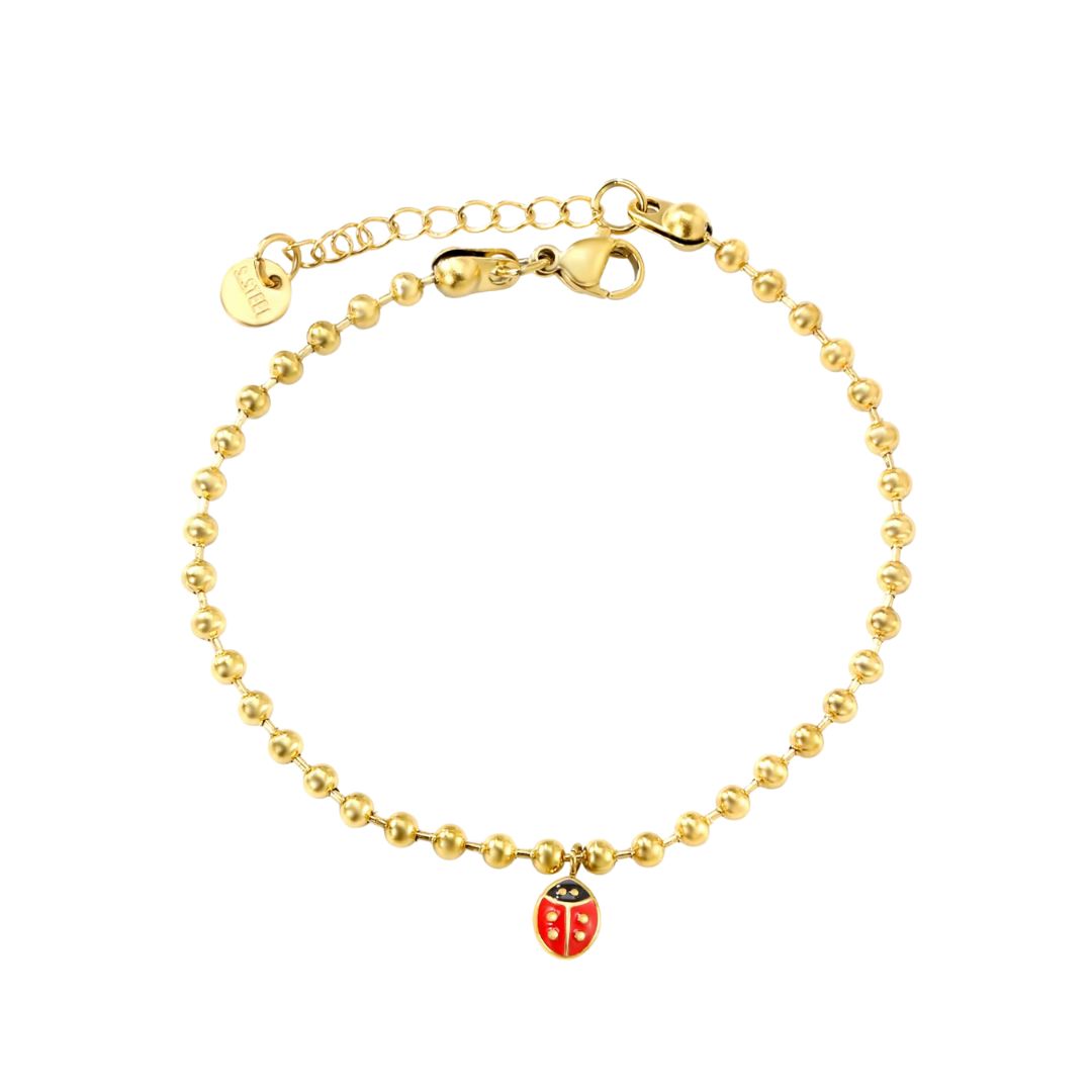 Bracelet Coccinelle Perles Dorées sur fond blanc