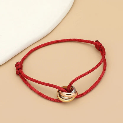 Bracelet Cordon Femme Anneaux Enlacés Acier Inoxydable