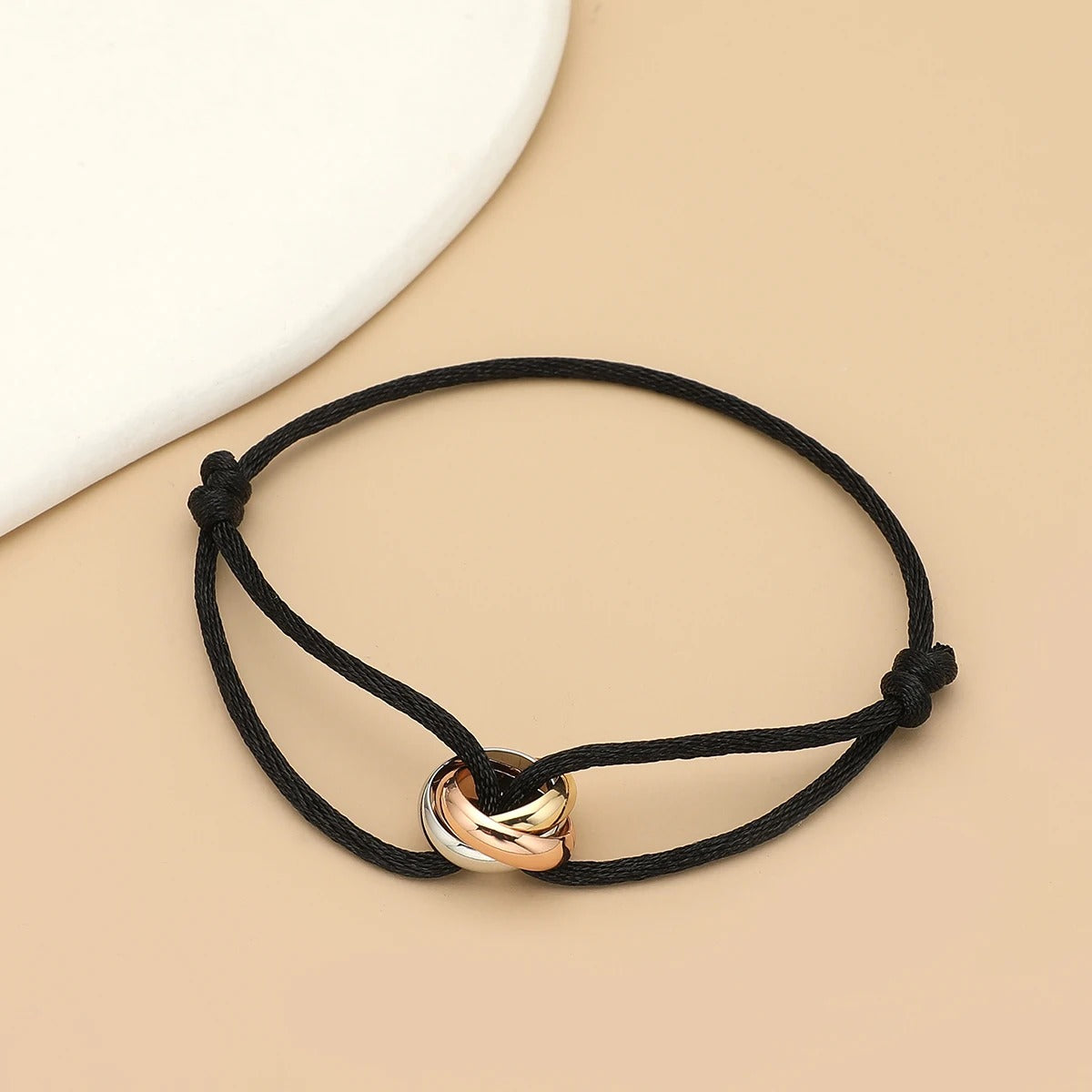 Bracelet Cordon Femme Anneaux Enlacés Acier Inoxydable