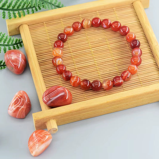 Bracelet Cornaline à Perles Rondes sur du bois