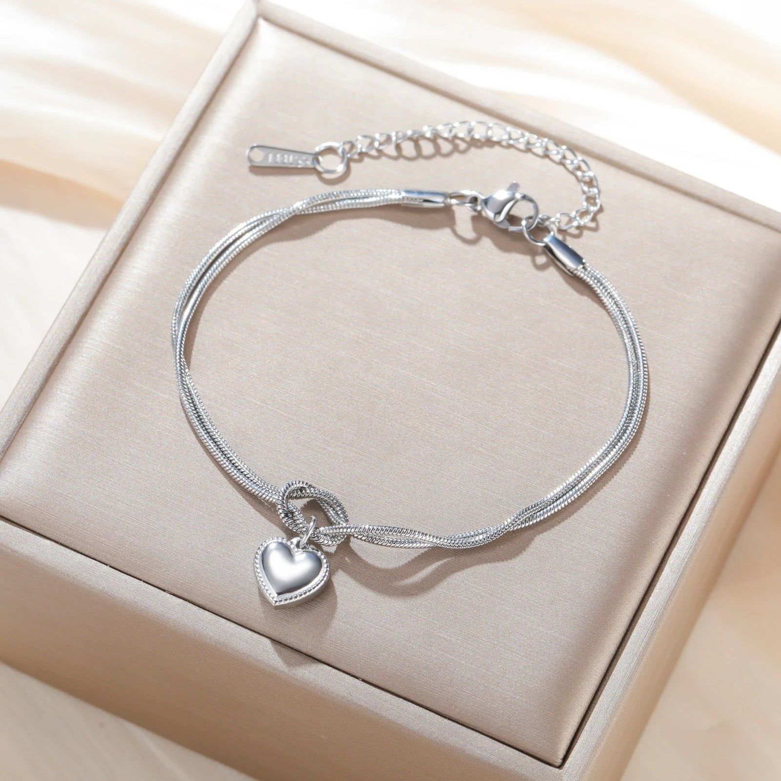 Bracelet Couple Nœud Cœur Éclat Intemporel - Acier Inoxydable