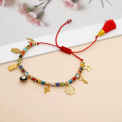Bracelet Croix Femme Multi-symboles