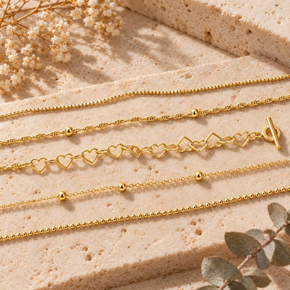 Bracelet Femme Multirang Superposés Et Cœurs Dorés