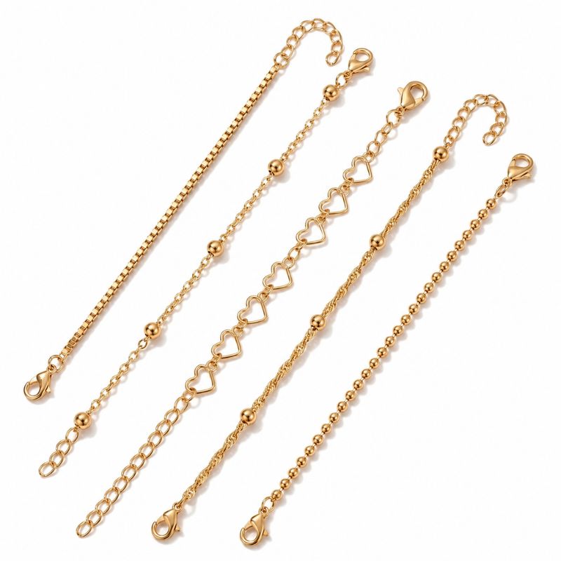Bracelet Femme Multirang Superposés Et Cœurs Dorés