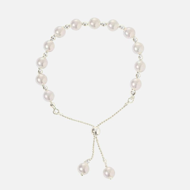 Bracelet Perle Blanche Ajustable Éclat Doré