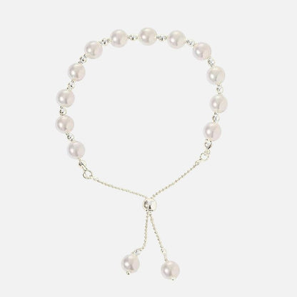 Bracelet Perle Blanche Ajustable Éclat Doré