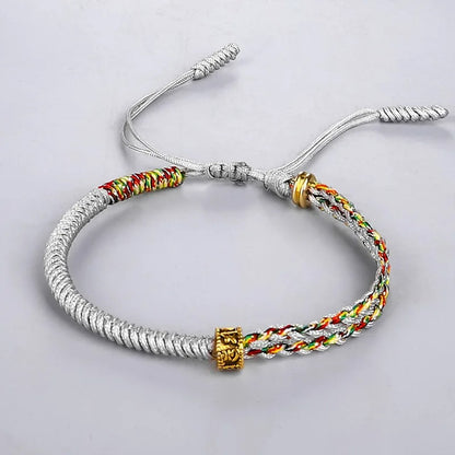Bracelet Tibétain Corde Tressée Perle Dorée