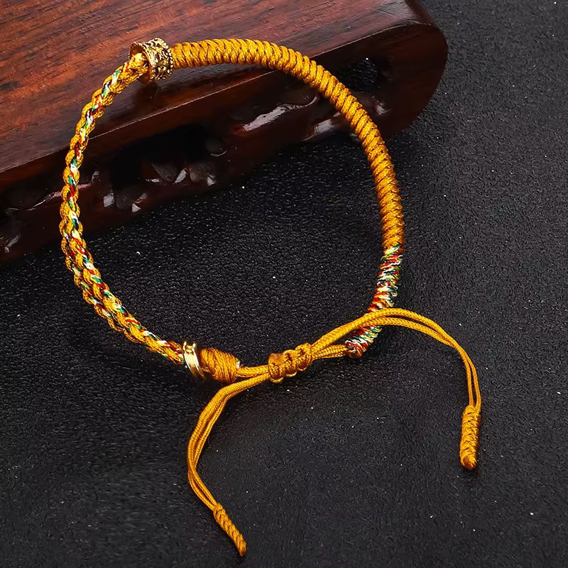 Bracelet Tibétain Corde Tressée Perle Dorée